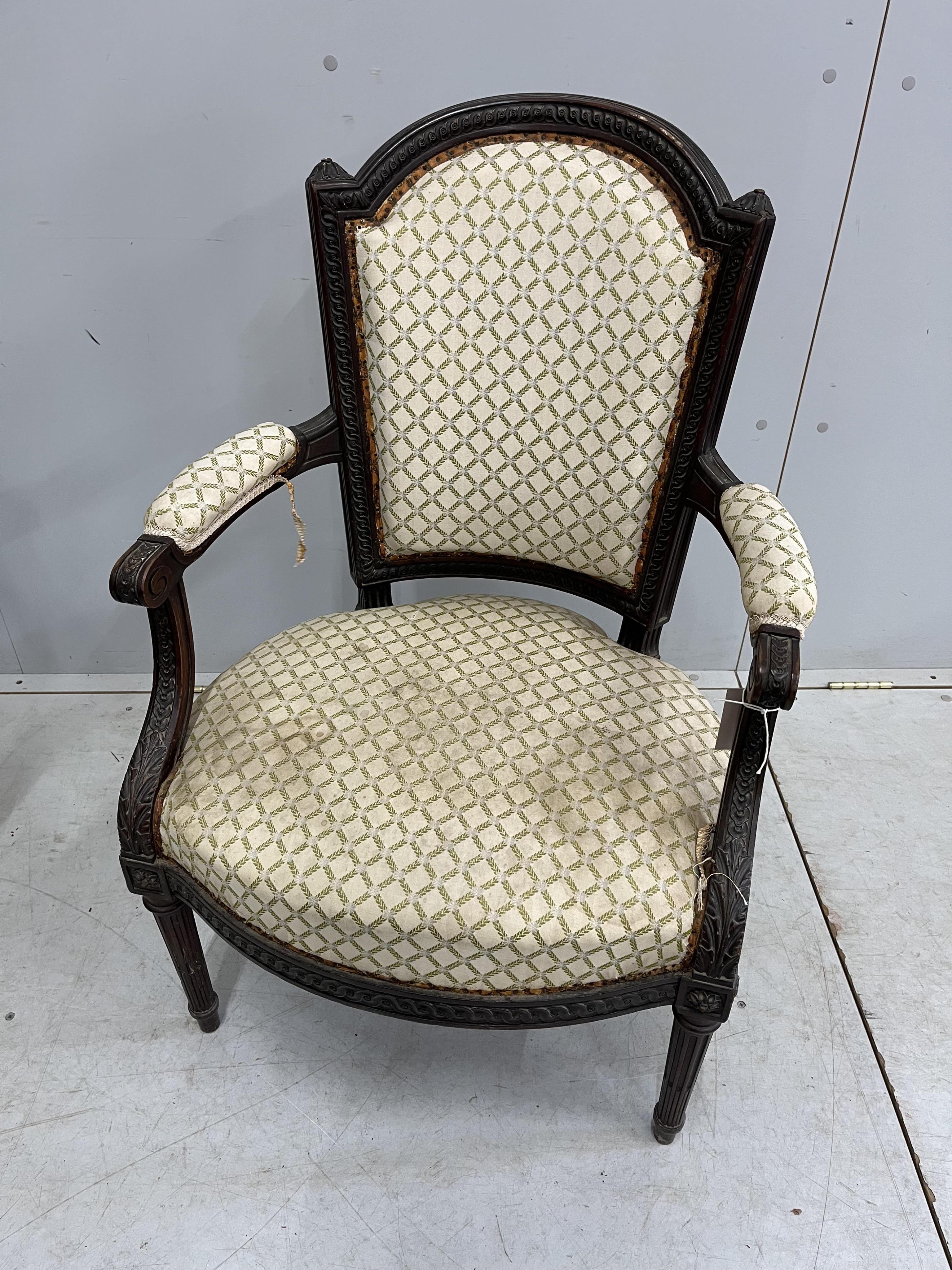 A pair of early 20th century mahogany fauteuil, width 59cm, depth 50cm, height 91cm. Condition - fair